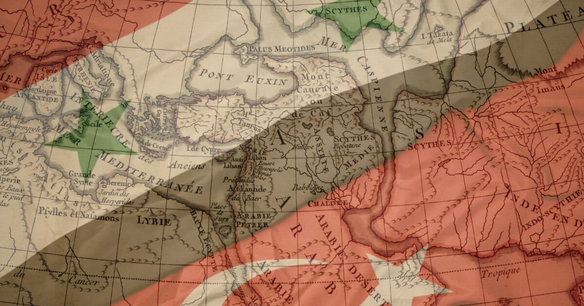 Maps of modern Syria and Turkey diagonally beneath an opague map of the ancient middle east when the Arabian Empire encompassed modern day Syria.
