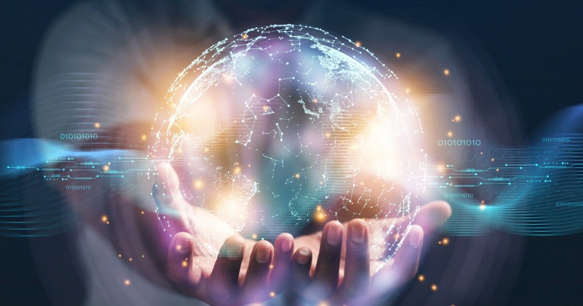 A pair of hands holding a image of a glowing world with technological chip circuit designs stemming out from the world image centerpiece.